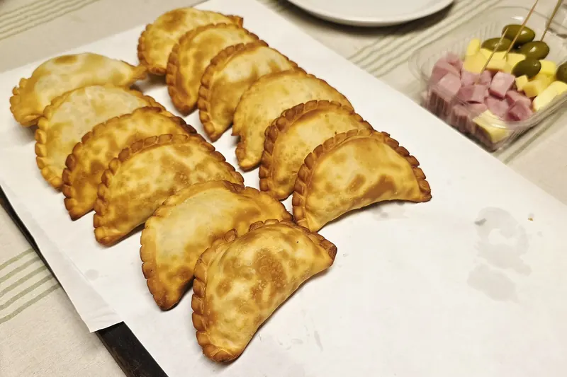 A tray of fried Argentine beef empanadas