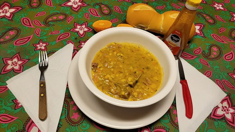 A bowl of Argentine locro, a hearty stew of corn, beans and meat