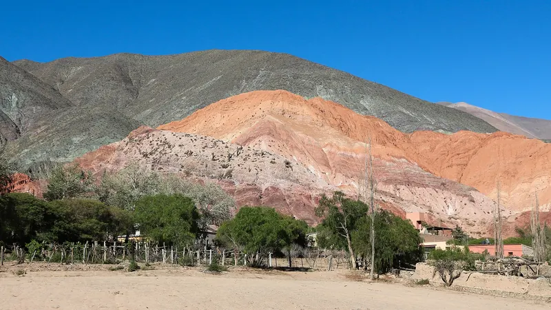 The striped Hill of Seven Colours rising above Purmamarca in the Argentine north-west