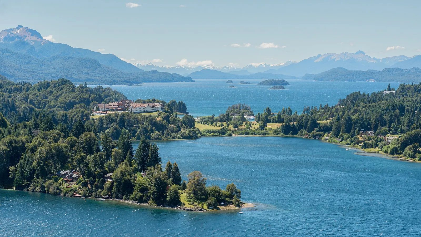 The Llao Llao peninsula between two arms of Lake Nahuel Huapi with mountains behind