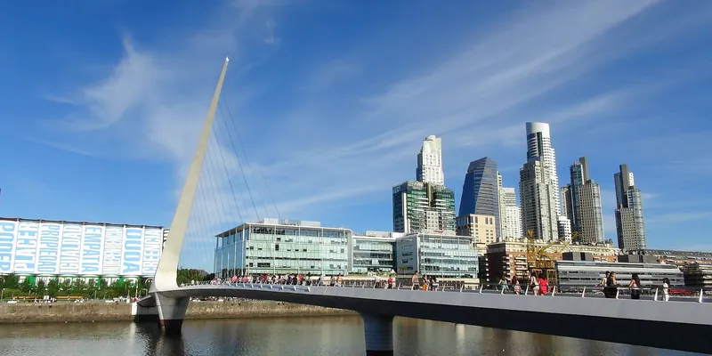 The white Puente de la Mujer pedestrian bridge in Puerto Madero