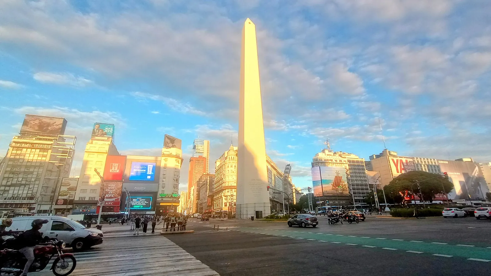 The Obelisco monument in Buenos Aires at sunset with wide avenues around it