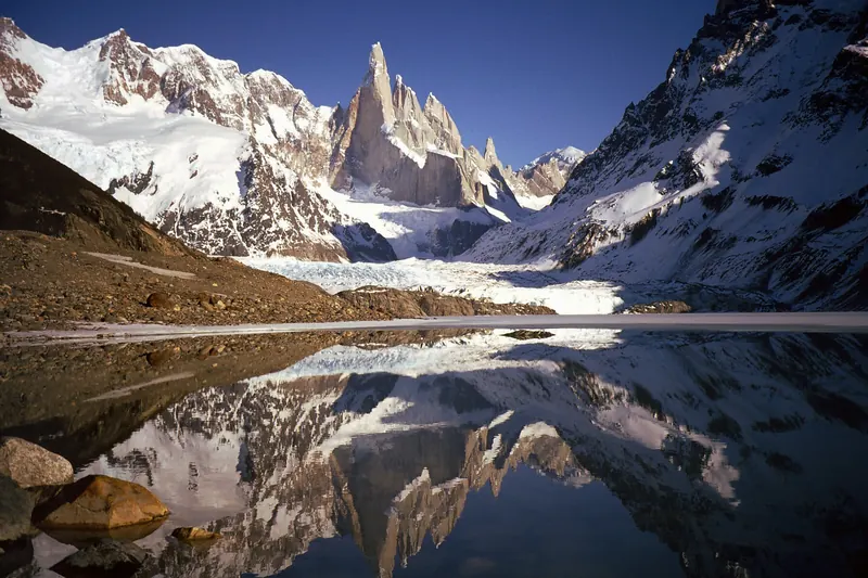 Cerro Torre rising above Laguna Torre and its icebergs