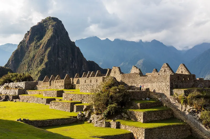 Stone terraces and ruins of an ancient citadel on a mountain ridge