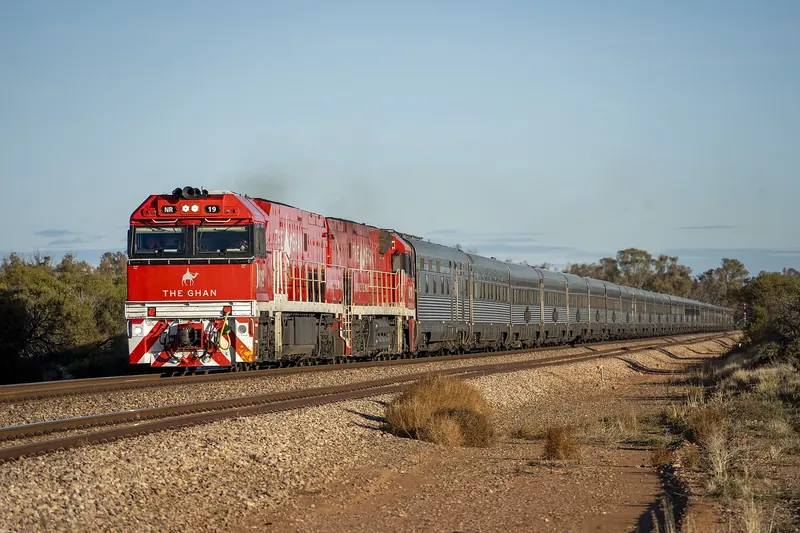 The Ghan passenger train travelling through the Australian outback