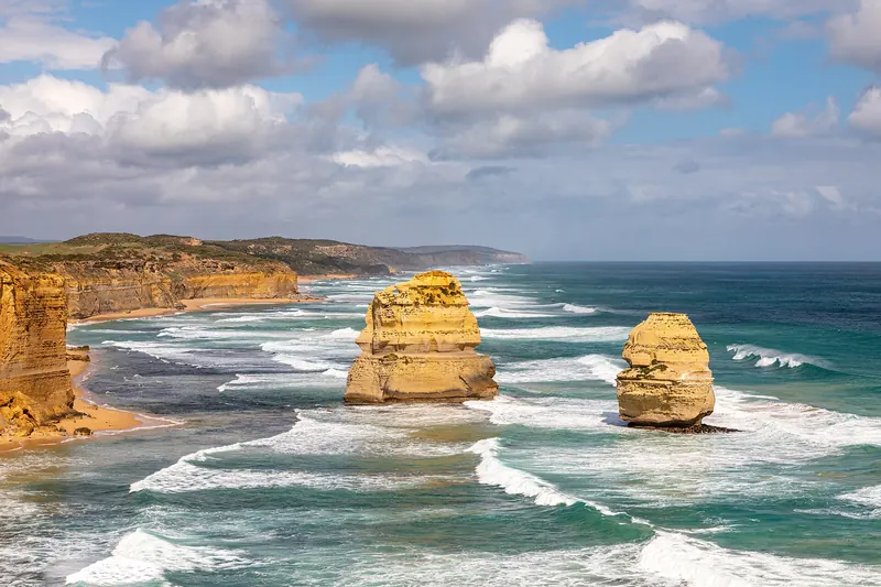 The Twelve Apostles limestone stacks rising from the sea off the Victorian coast
