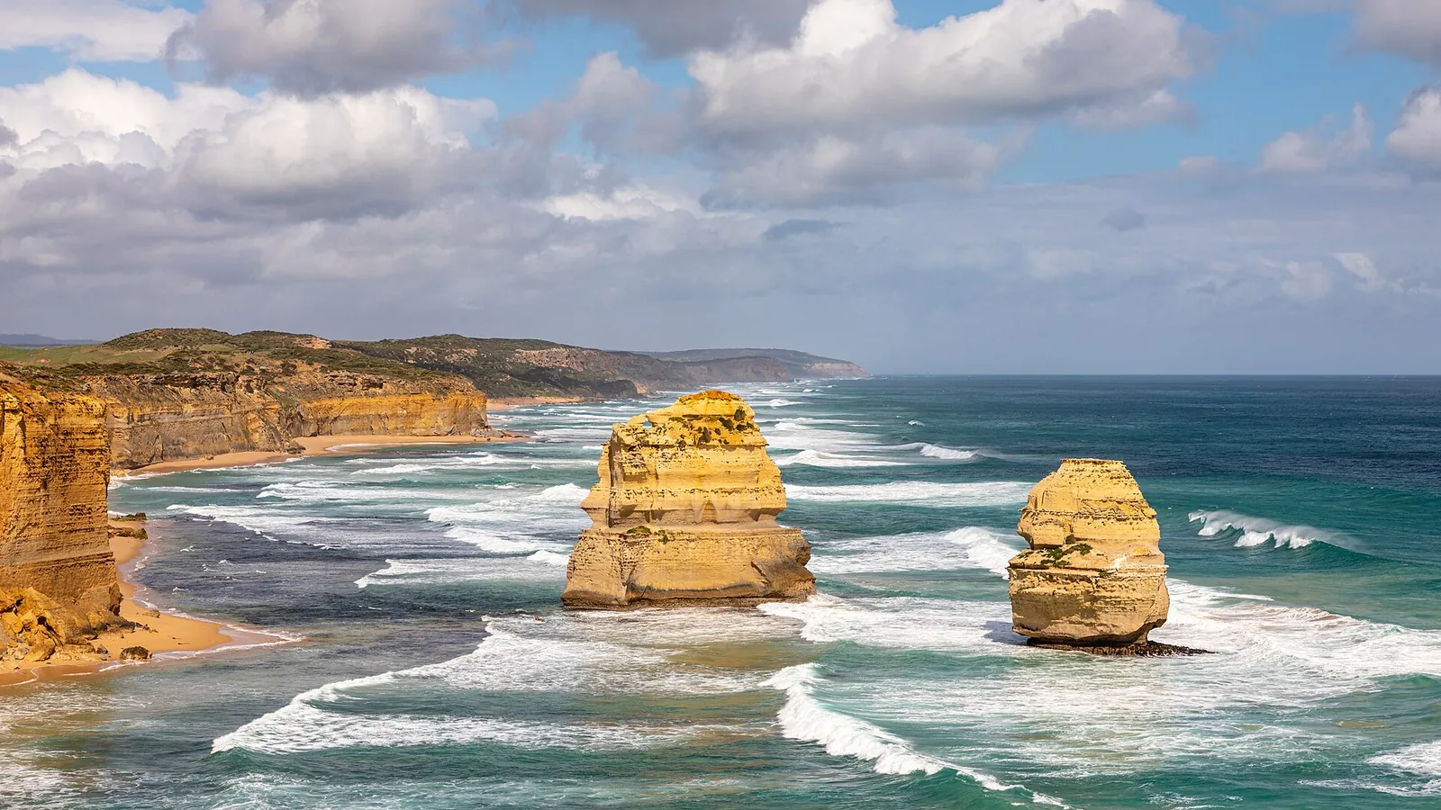 The Twelve Apostles limestone stacks rising from the sea off the Victorian coast
