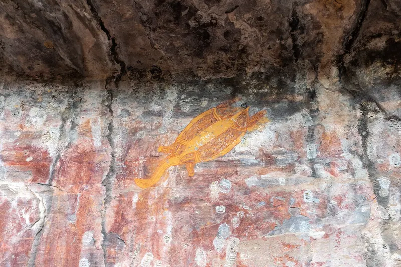 Aboriginal rock art paintings on a sandstone wall at Ubirr in Kakadu