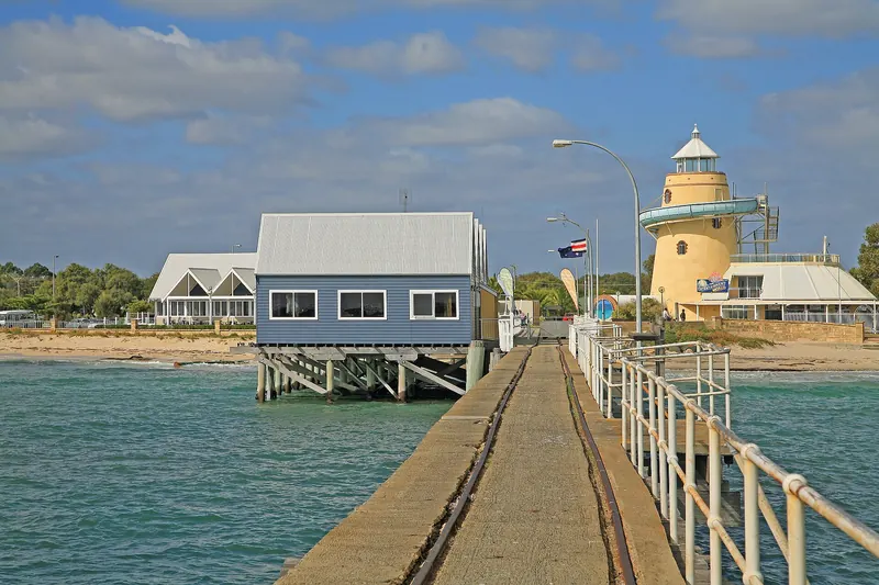 The long timber Busselton Jetty stretching over the sea