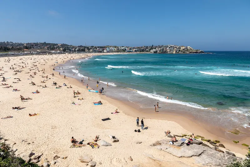 Surfers and swimmers at Bondi Beach in Sydney