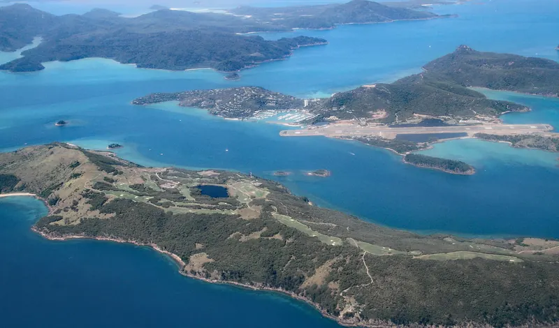 An aerial view of Hamilton Island and its airport in the Whitsundays