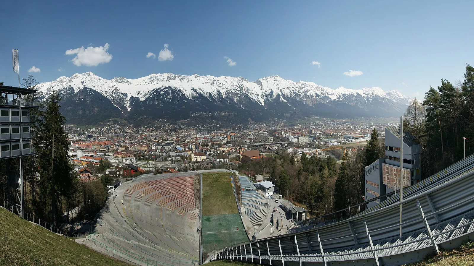 Innsbruck's old town with the snow-capped Nordkette mountains rising directly behind it