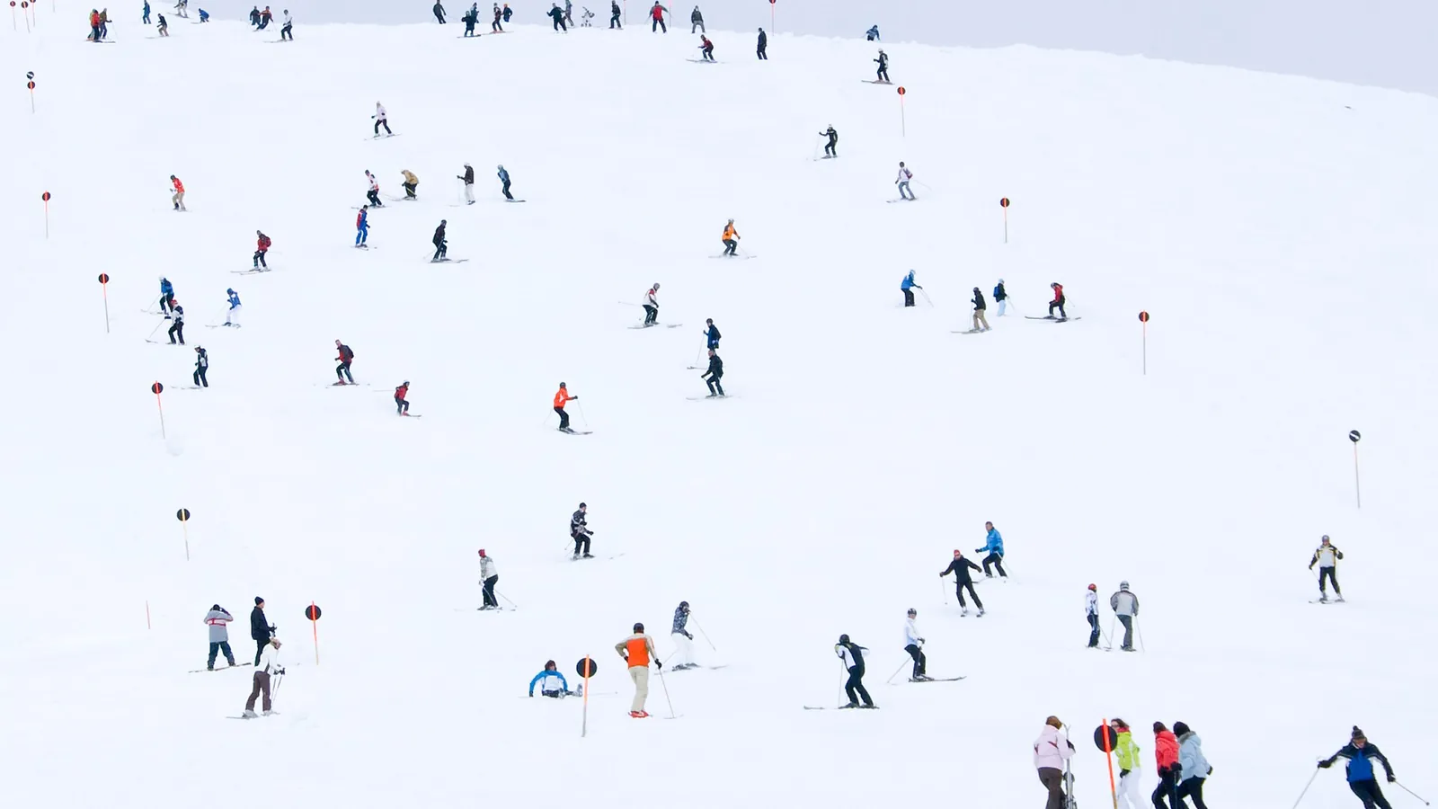 Skiers on a slope in the Austrian Alps