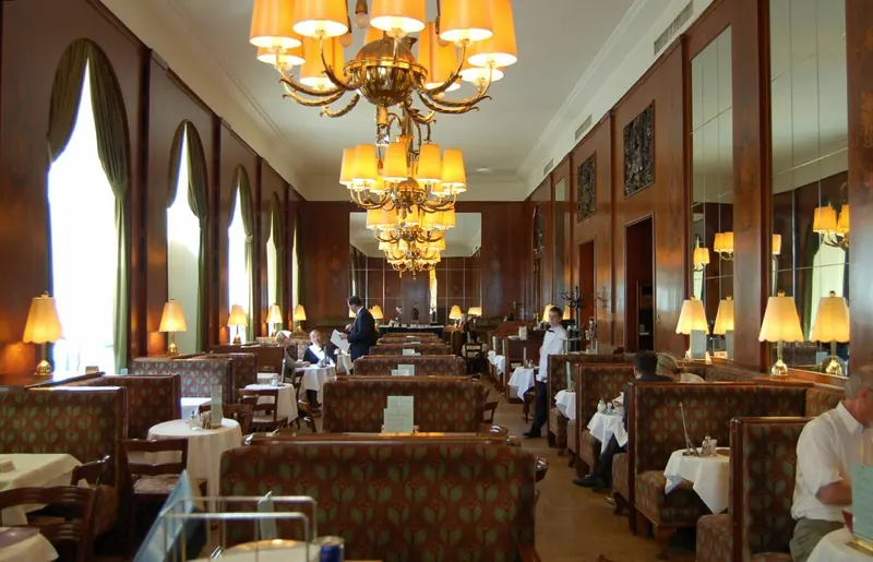 The ornate interior of a traditional Viennese coffee house