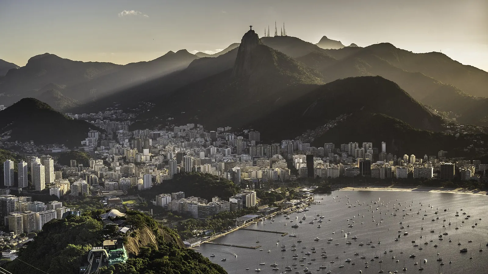 The skyline of Rio de Janeiro and Sugarloaf Mountain at sunset over Guanabara Bay