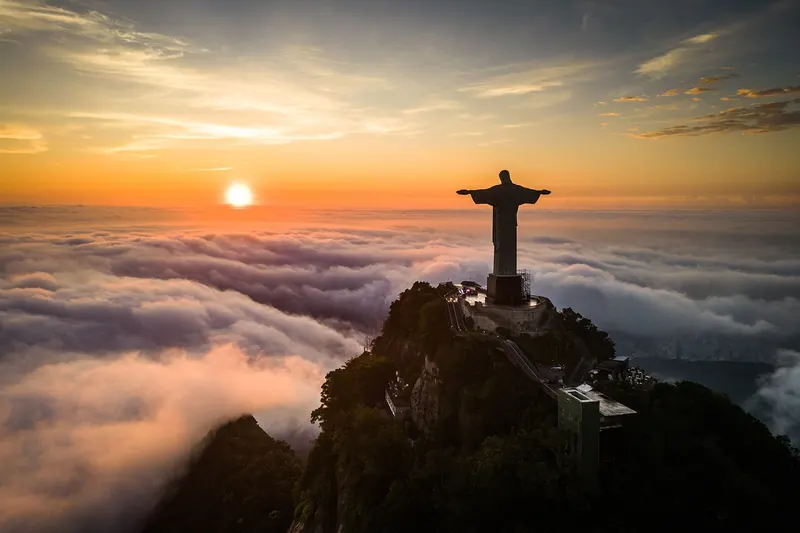 The statue of Christ the Redeemer rising above the clouds on Corcovado