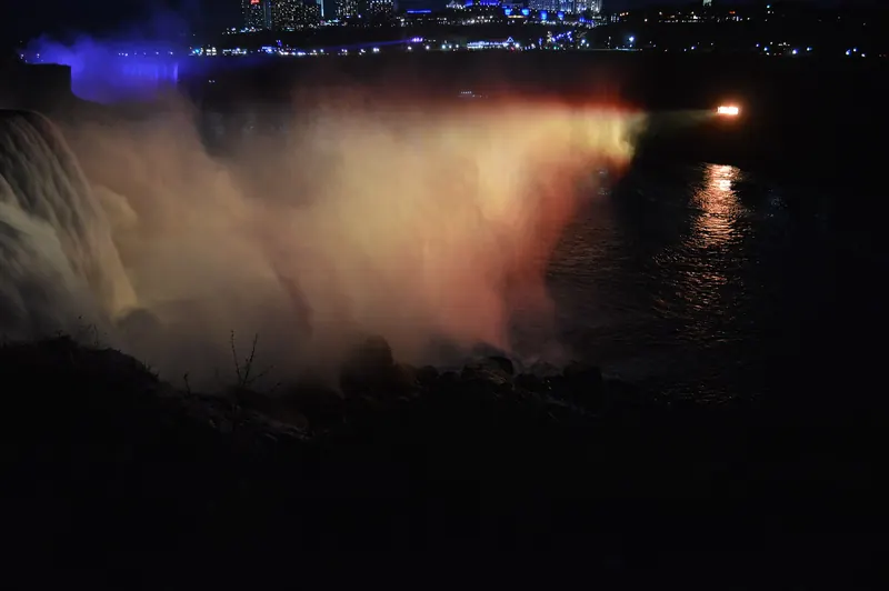 Niagara Falls illuminated with fireworks