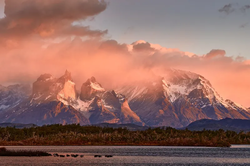The Cuernos del Paine peaks above a lake in Patagonia