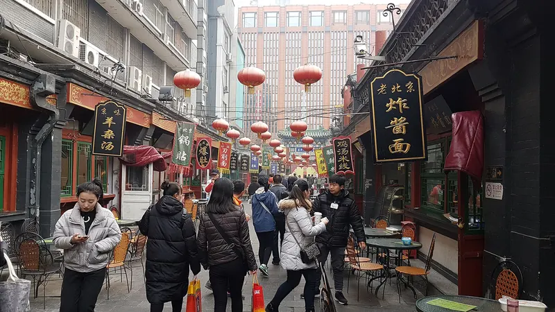 Wangfujing snack street hung with red lanterns and lined with food stalls