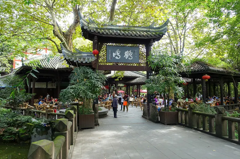 Tables and chairs at an outdoor teahouse in People's Park