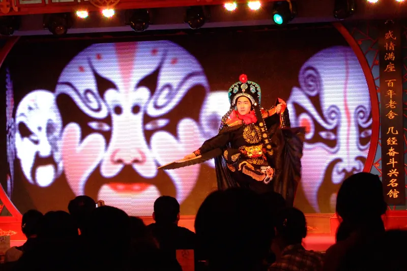 A Sichuan Opera performer mid face-changing act
