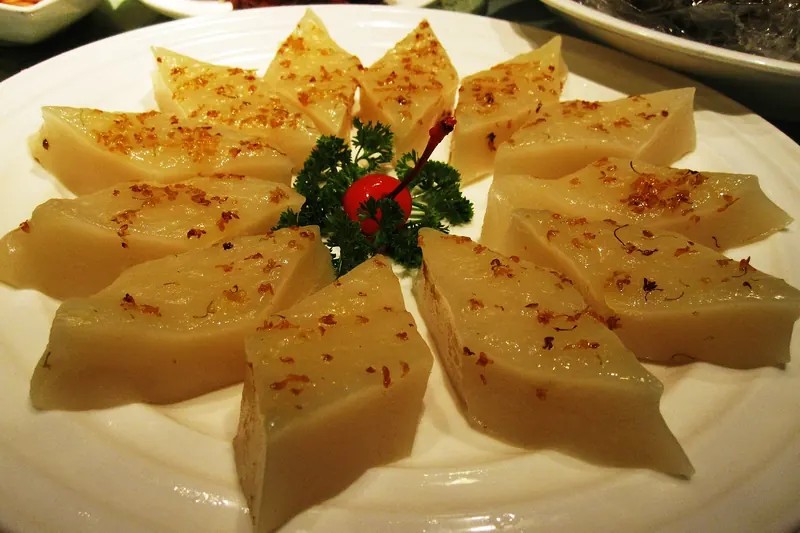 A sweet cake flavoured with osmanthus (sweet tea olive) blossom
