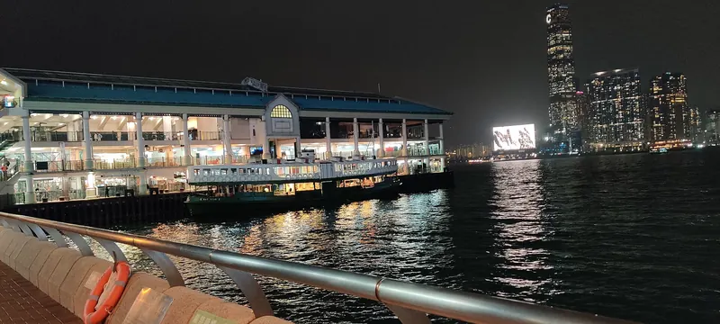 A green-and-white Star Ferry crossing Victoria Harbour