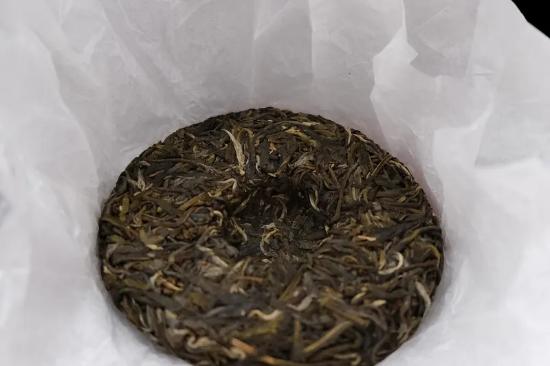 A pressed cake of aged Yunnan pu'er tea