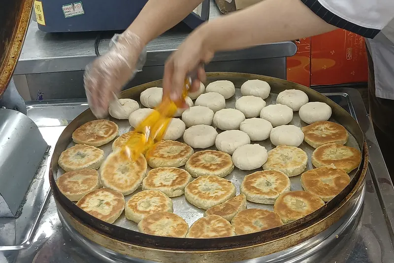 Flaky, golden scallion pancakes cut into wedges