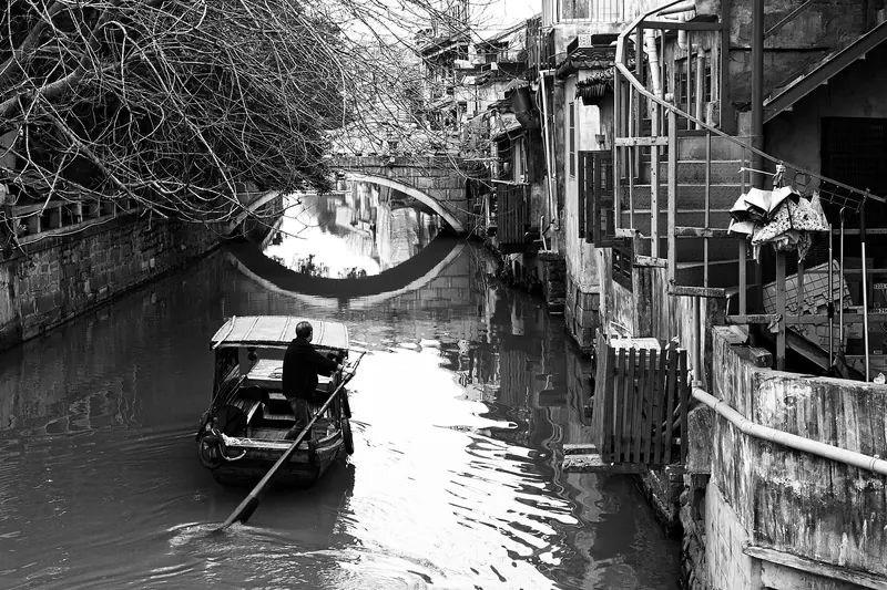 A canal lined with old houses in Suzhou's historic centre