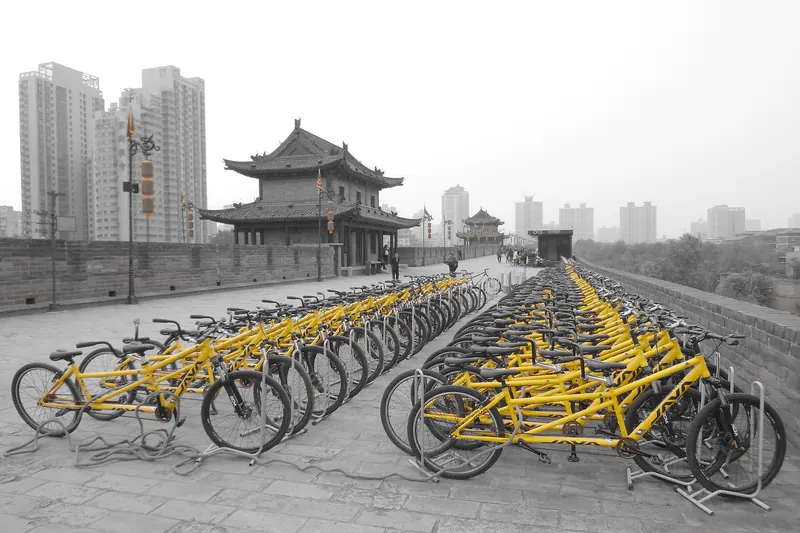 Bicycles parked on top of the wide, complete Xi'an City Wall