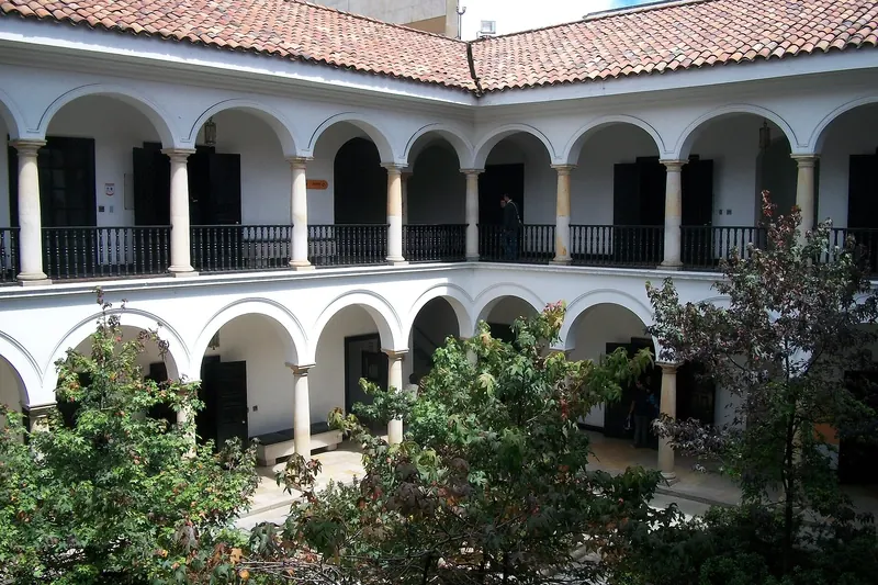 The courtyard of the Botero Museum with a large sculpture