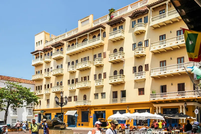 Plaza de Santo Domingo in the old city of Cartagena with coloured colonial buildings