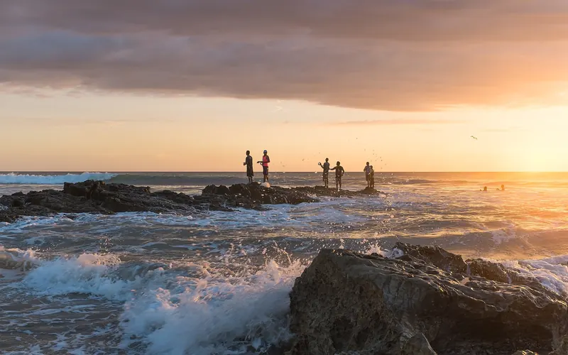 Fishermen at sunset on Playa Santa Teresa