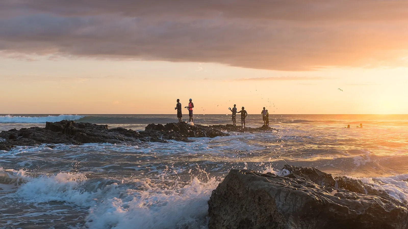 Fishermen at sunset on Playa Santa Teresa