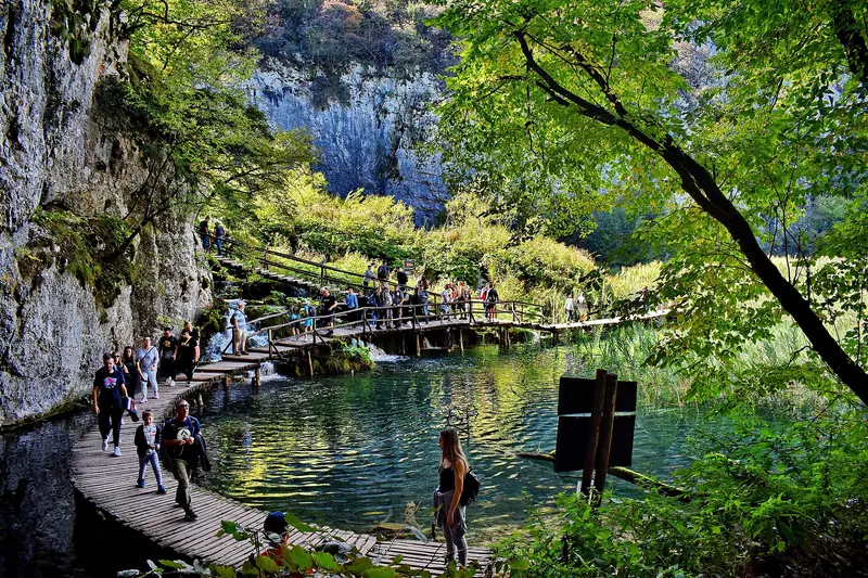 Wooden boardwalks over Plitvice Lakes' turquoise water