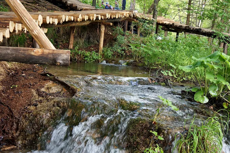 Wooden boardwalks over the water at Plitvice Lakes