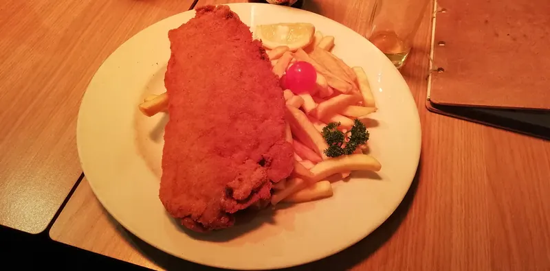 Zagrebački odrezak, a breaded veal schnitzel stuffed with ham and cheese
