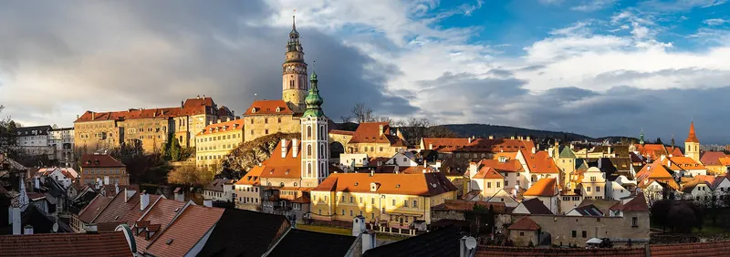 Sunset over Český Krumlov's old town from a castle lookout