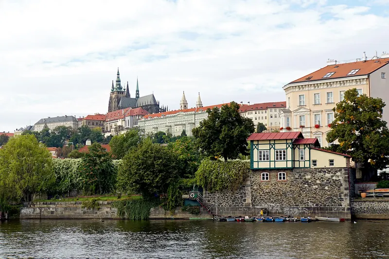 Prague's skyline along the Vltava River, with St Vitus Cathedral rising above Prague Castle