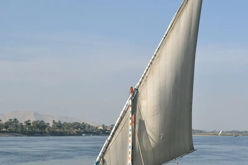 A traditional felucca sailboat on the Nile