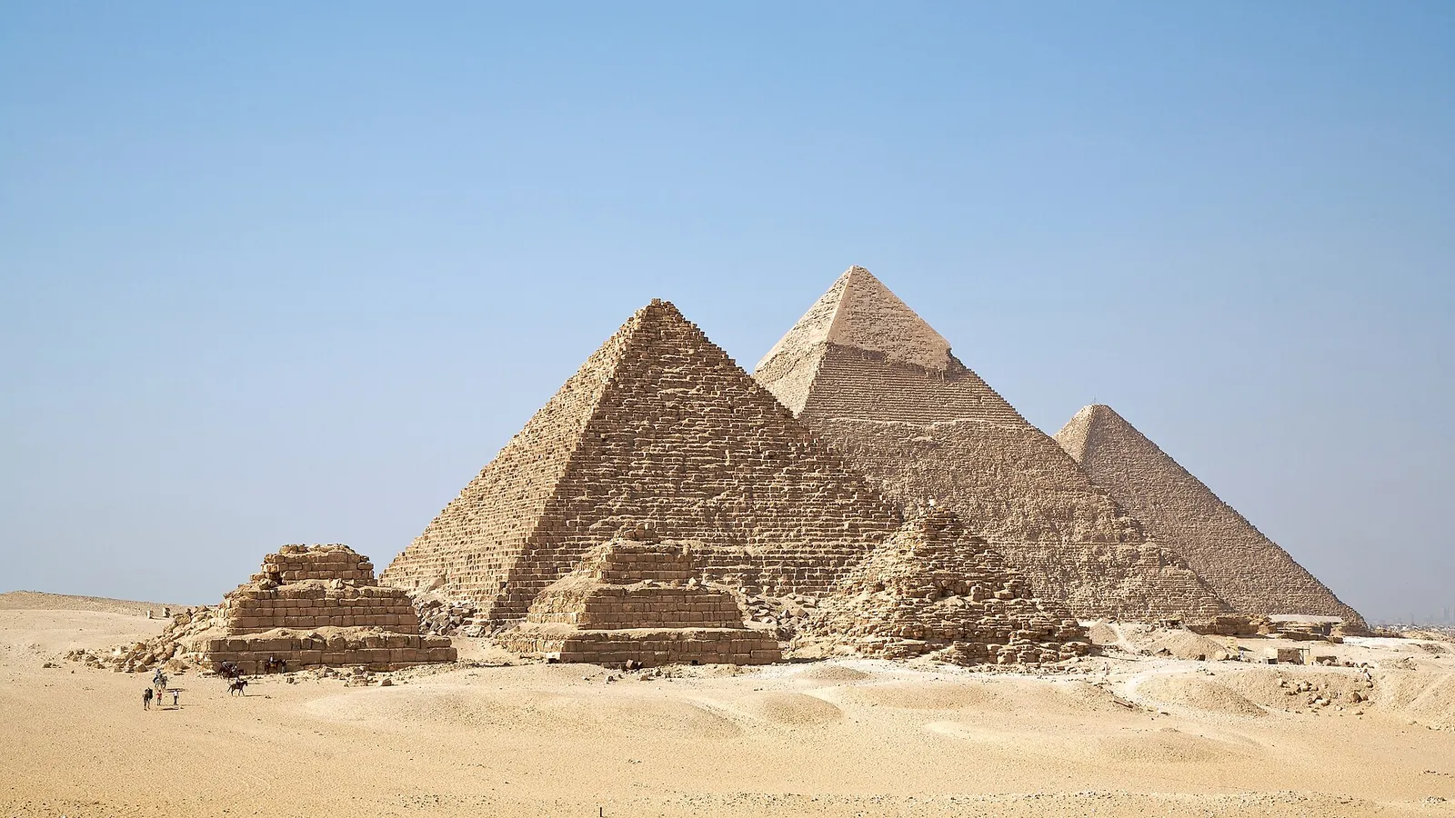 The Great Pyramids of Giza rising from the desert outside Cairo