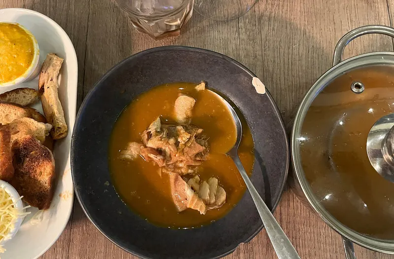 Bouillabaisse served in a restaurant on the Vieux-Port in Marseille
