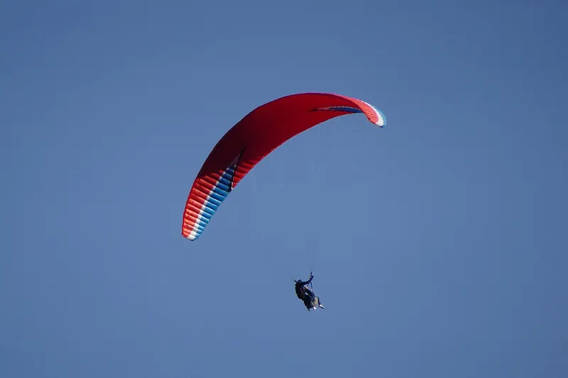 A tandem paraglider over the Chamonix valley