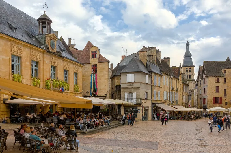 The golden limestone Place de la Liberté in Sarlat's old town