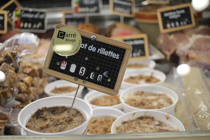 Pots of rillettes de Tours for sale at the covered market in Tours