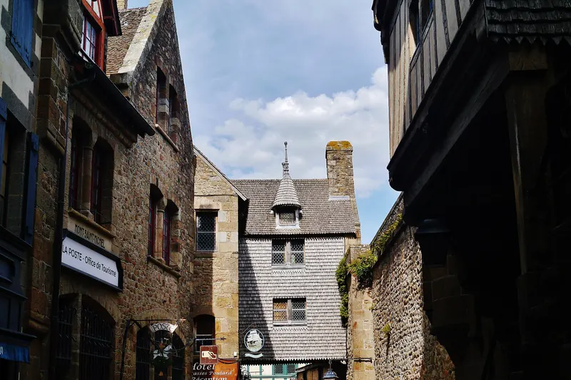 The narrow Grande Rue climbing through the village of Mont-Saint-Michel