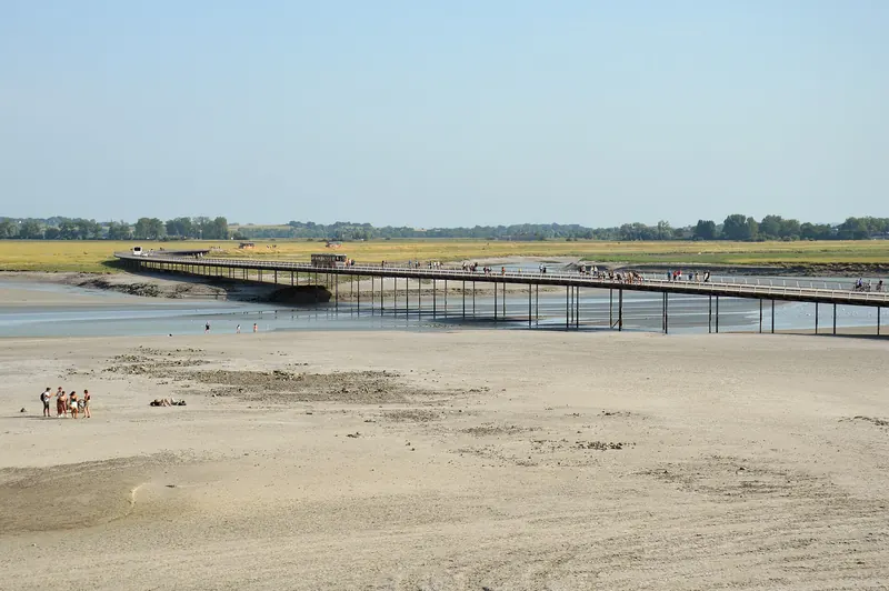 The mudflats of the bay stretching out below Mont-Saint-Michel at low tide