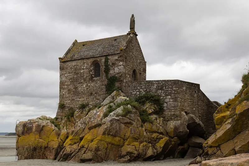 The small chapel of Saint-Aubert on the rocks at the foot of Mont-Saint-Michel
