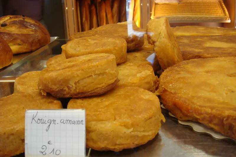 Kouign-amann pastries on sale at a Breton bakery